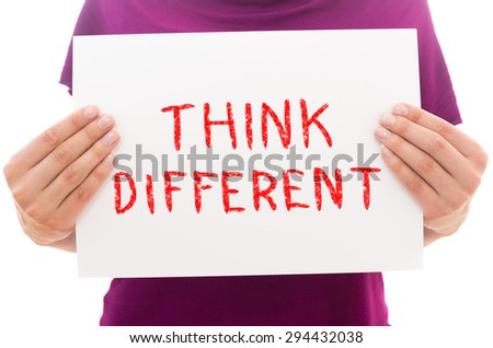 Girl holding white paper sheet with text Think different