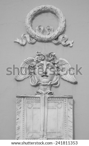 Relief on a building in the center of St.Petersburg, Russia. Black and white.