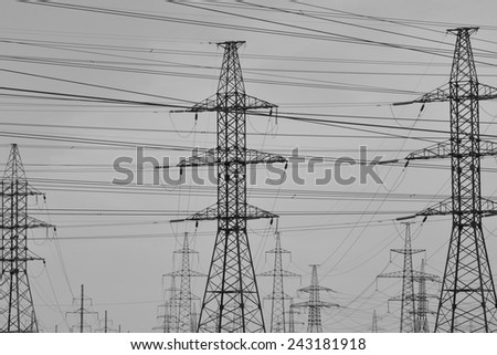 Power line at cloudy day, outskirts of St. Petersburg, Russia. Black and white.