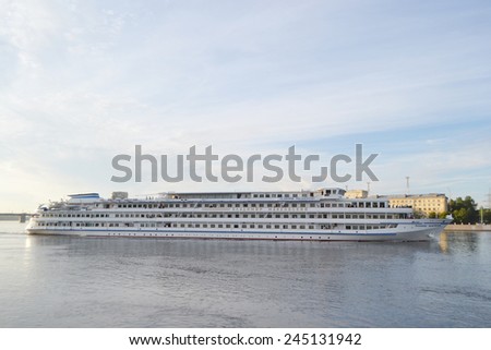 ST.PETERSBURG, RUSSIA - JULY 29, 2013: River cruise ship sailing on the river Neva.