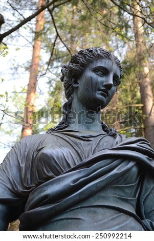 ST.PETERSBURG, RUSSIA - MAY 13, 2012: Statue of a woman in Pavlovsk park, suburb of St. Petersburg.
