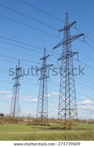 Spring landscape with power line, Russia.