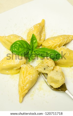 Culurgiones, traditional pasta from Sardinia, stuffing with pecorino cheese,potato and mint