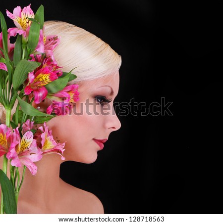 girl with irises, fashion and beautiful young woman with pink flowers over black background with copy space
