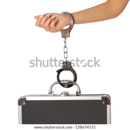case of money in handcuffs with female hand, isolated on white. concert