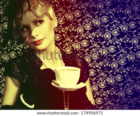 Retro Woman with Coffee Cup. Portrait of Fashion Beautiful Blonde. Vintage style.