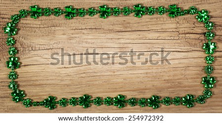 St. Patrick's Day. Frame on wooden background