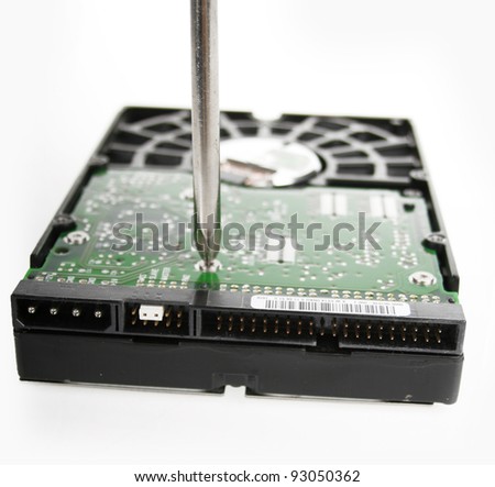 Repairing a computer hard drive isolated on a white background