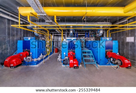 Interior gas boiler with three boilers.