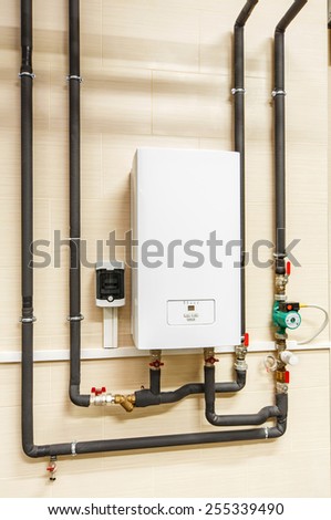 household electric water heater, pump and piping.