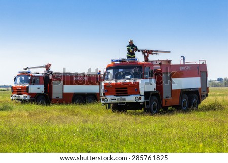 Ukraine, Borispol - MAY 22 : Fire Service International Airport Boryspil spends doctrines on suppression aircraft on May 22, 2015 in Borispol, Ukraine