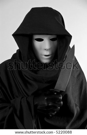 Monster Mash Ball Costumes :D Stock-photo-a-man-in-a-scary-halloween-costume-holding-a-large-butcher-knife-5220088