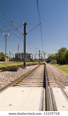 The tracks of a light rail or cable car system.