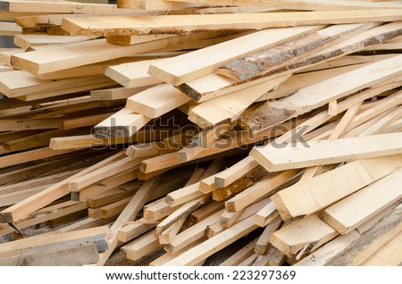 Background of stack wood boards in warehouse