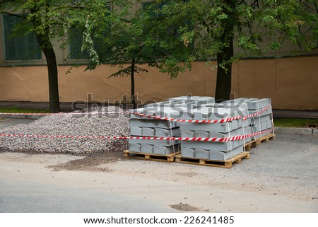 sidewalk concrete blocks are prepared for road repair works