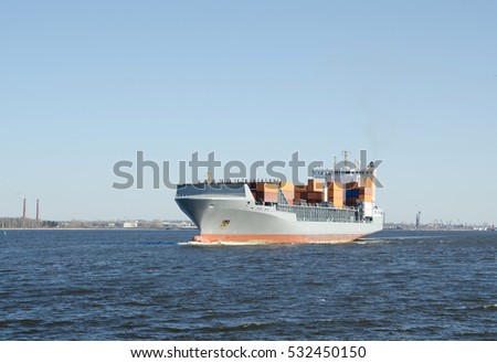 Big Cargo ship sailing in still water