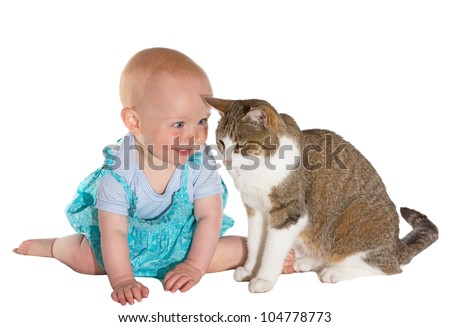 Cat and smiling little baby isolated on white