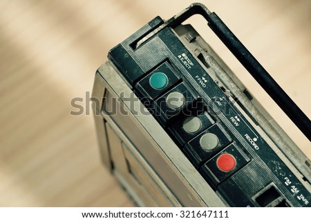 Dusty old radio with one cassette player