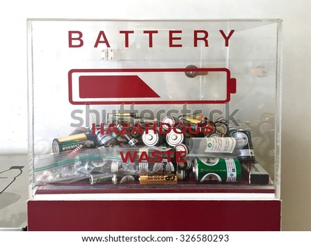 Bangkok, Thailand - October 11, 2015: Box for hazardous waste for used batteries provided by the street near the exit of environmental friendly building in Bangkok, Thailand.