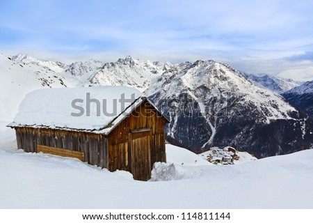 House on mountains at ski resort Solden Austria - nature and sport background