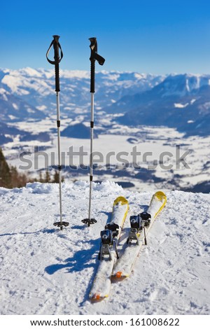 Mountains skis and ski-sticks - St. Gilgen Austria - nature and sport background
