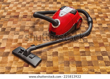 Vacuum cleaner on carpet - technology housework