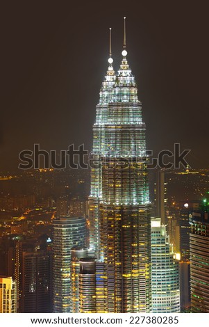 KUALA-LUMPUR, MALAYSIA - APRIL 08: Twin towers Petronas at night April 08, 2011, Kuala Lumpur, Malaysia.