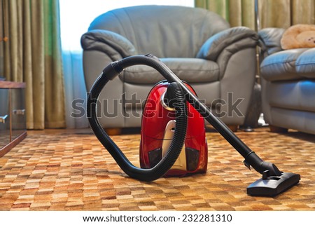 Vacuum cleaner in room - technology housework