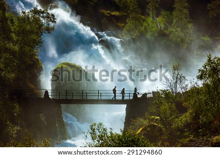 Waterfall near Briksdal glacier - Norway - nature and travel background