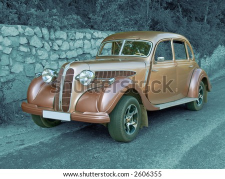 Antique vintage car (colored) on monochromatic background, jpeg file contain clipping path