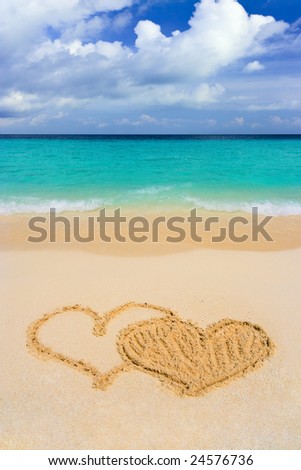 stock photo : Drawing connected hearts on beach, love concept