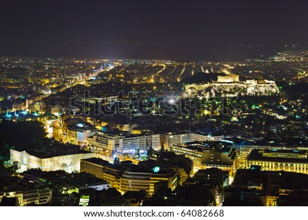 Acropolis and Athens in Greece at night - travel background