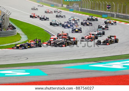 SEPANG, MALAYSIA - APRIL 10: Cars on track at race of Formula 1 GP, April 10 2011, Sepang, Malaysia. First lap.