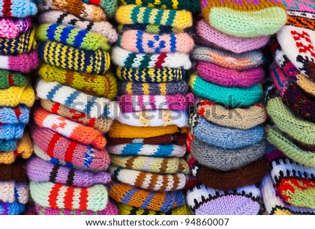 Pile of wool clothing - winter fashion background