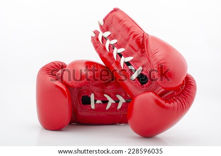 red leather boxing gloves isolated on white background