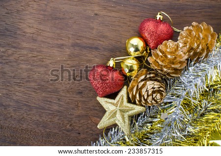 Pine cone christmas decoration on wooden floor