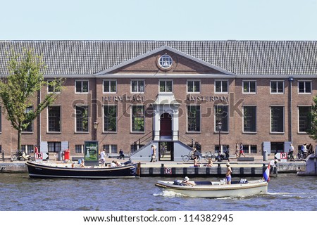 AMSTERDAM-AUG. 19: Hermitage Museum on Aug. 19, 2012 in Amsterdam. A dependency of Hermitage Museum Saint Petersburg on the Amstel river, with 12,846 sq meters, currently its largest dependency.