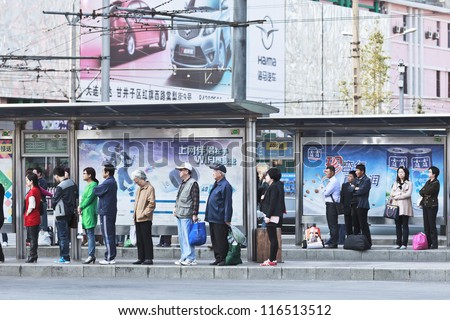 DALIAN-CHINA-OCT. 14, 2012. Station with advertising on Oct 14, 2012 in Dalian. China has 50,000 outdoor advertising companies. This advertising became third largest medium after TV and print media.