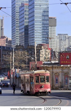 DALIAN-NOV. 26: Retro tram in Dalian, a Chinese city where are no longer many bicycles. Dalian has an efficient public transport with the China\'s second oldest tram-system on Nov. 26, 2012 in Dalian.