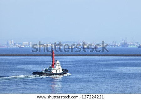 DALIAN-CHINA-NOV. 3. Tugboat in the Port of Dalian in Liaoning Province. It is the most northern ice-free port in China, covers water area of 346 km2, land area of 15 km2. Dalian, Nov. 3, 2012.