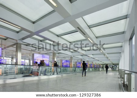 BEIJING-FEB. 21. Corridor with moving walkway, Beijing Capital Airport Terminal 3. The world\'s largest airport terminal has 243 elevators, escalators or moving walkways. Beijing, Feb. 21, 2013.