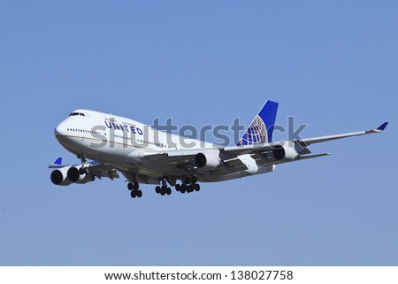 BEIJING-MAY 10. United Airlines Boeing 747-422, N118UA landing. Best-selling model of the Boeing 747 family of jet airliners. It can fly 14,200 km non-stop with maximum payload. Beijing, May 10, 2013.