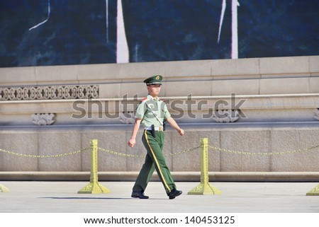 BEIJING-MAY 29. Honor guard marching at Tiananmen. Honor guards are provided by People\'s Liberation Army at Tiananmen Square for flag-raising ceremony and presence on Tiananmen. Beijing, May 29, 2013.