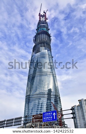 SHANGHAI-JUNE 10. Shanghai Tower (under construction). Tallest skyscraper in China, design by Gensler, completion 2014. Specs: 632m tall, 121 stories, floor area 380,000 sq.m. Shanghai, June 10, 2013.