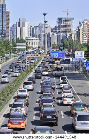 BEIJING-JULY 3. Traffic jam on Beijing fourth ring-road. Recently the number of cars in Beijing hit 4,5 million and the city\'s its car fleet grows at 1,000 cars daily. Beijing, July 3, 2013.