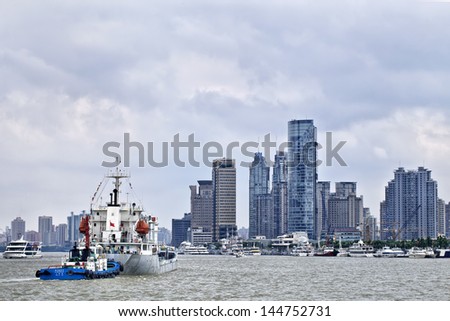 SHANGHAI-??JUNE 6. Vessels on Huangpu River. Shanghai port overtook in 2010 Singapore port to become the world\'s busiest container port. SH port handled 29.05 million TEUs. Shanghai, June 6, 2013.