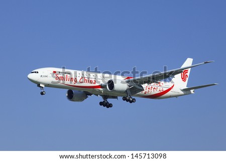 BEIJING-JULY 5. Air China Boeing 777-39L(ER), B-2035 is landing. A long-range wide-body twin-engine jet airliner, capacity 300-550 passengers, range 5,235-9,380 nautical miles. Beijing, July 5, 2013.