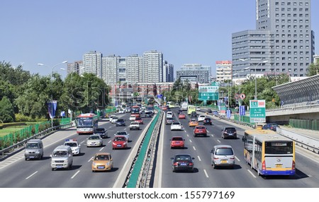 BEIJING - SEPTEMBER 25. Traffic on G6 express way in Beijing, China, 25 of September, 2013. Beijing\'s economic planner, invites foreign investors to bid on 126 urban infrastructure projects seeking $55 billion in financing.