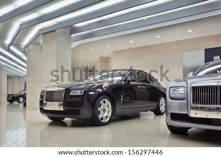 Beijing-April 6. Rolls-Royces In A Showroom. Luxury Car Brand Rr, Owned By Bmw, Expects Slowed Sales In China In 2013 Because President Xi Jinping Demands More Austerity. Beijing, April 6, 2013.