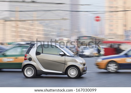 BEIJING-DEC. 6. Smart Car on the road. Smart Car sales in China grew 45% in 2012 to 15,680 vehicles. But given the size of China\'s car market, it is still a niche player. Beijing, Dec. 6, 2013.